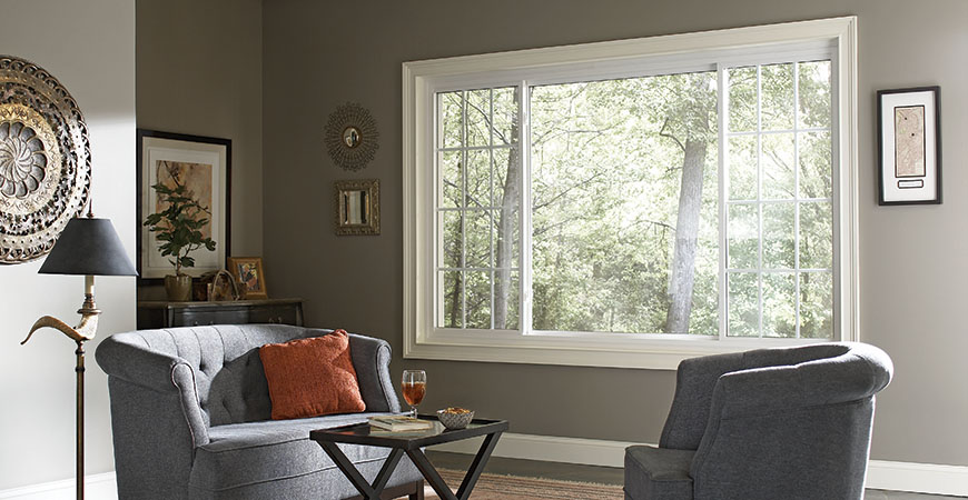 Wide Alside Mezzo picture window with white frame in a living room